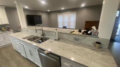 Beautifully Updated 4 bedroom 3 bath home located on large lot on Lakes of the Four Seasons Country Club in Indiana - for sale on GolfHomes.com, golf home, golf lot