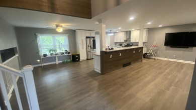 Beautifully Updated 4 bedroom 3 bath home located on large lot on Lakes of the Four Seasons Country Club in Indiana - for sale on GolfHomes.com, golf home, golf lot