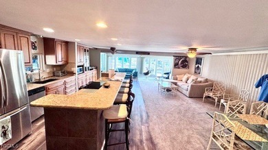 Welcome to your dream Waterfront home in Old Bridge Village! on Riverbend Golf and Country Club in Florida - for sale on GolfHomes.com, golf home, golf lot