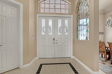 Discover this spacious 4-bedroom, 3-bath pool home in the on PGA National Estates Golf Course in Florida - for sale on GolfHomes.com, golf home, golf lot