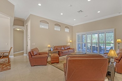 Discover this spacious 4-bedroom, 3-bath pool home in the on PGA National Estates Golf Course in Florida - for sale on GolfHomes.com, golf home, golf lot