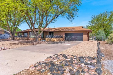 This Pueblo West beautiful brick home sits on the 7th fairway of on Desert Hawk At Pueblo West in Colorado - for sale on GolfHomes.com, golf home, golf lot