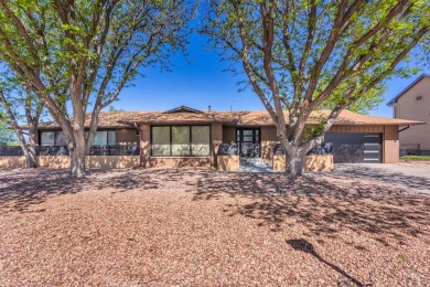 This Pueblo West beautiful brick home sits on the 7th fairway of on Desert Hawk At Pueblo West in Colorado - for sale on GolfHomes.com, golf home, golf lot