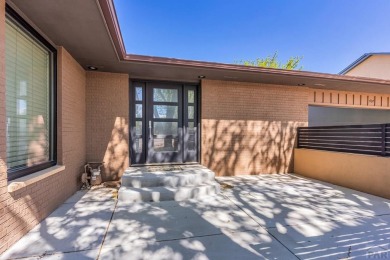 This Pueblo West beautiful brick home sits on the 7th fairway of on Desert Hawk At Pueblo West in Colorado - for sale on GolfHomes.com, golf home, golf lot