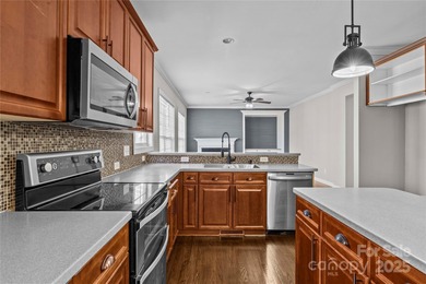 Step into a home designed for the way you live today. Offering on Highland Creek Golf Club in North Carolina - for sale on GolfHomes.com, golf home, golf lot