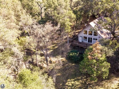 Cozy Chalet overlooking beautiful grounds, seasonal creek, large on Pine Mountain Lake Country Club in California - for sale on GolfHomes.com, golf home, golf lot