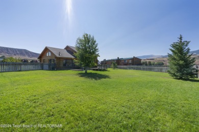 Nestled in the heart of Dubois, this authentic Swedish Cope log on Antelope Hills Golf Course in Wyoming - for sale on GolfHomes.com, golf home, golf lot