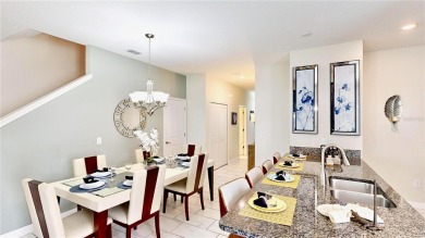 Escape to paradise in this stunning 5-bedroom townhome nestled on The Oasis Club at Champions Gate in Florida - for sale on GolfHomes.com, golf home, golf lot