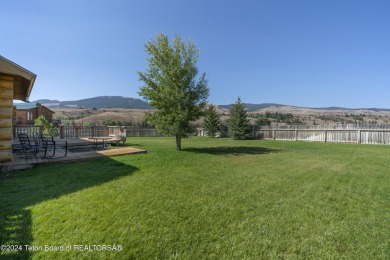 Nestled in the heart of Dubois, this authentic Swedish Cope log on Antelope Hills Golf Course in Wyoming - for sale on GolfHomes.com, golf home, golf lot