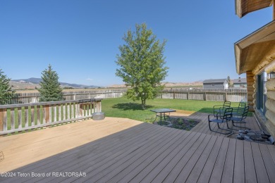 Nestled in the heart of Dubois, this authentic Swedish Cope log on Antelope Hills Golf Course in Wyoming - for sale on GolfHomes.com, golf home, golf lot