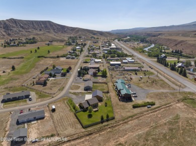 Nestled in the heart of Dubois, this authentic Swedish Cope log on Antelope Hills Golf Course in Wyoming - for sale on GolfHomes.com, golf home, golf lot