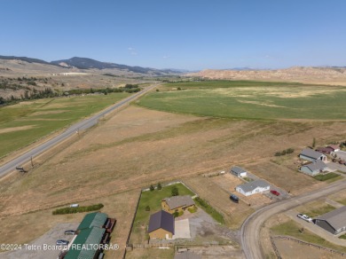 Nestled in the heart of Dubois, this authentic Swedish Cope log on Antelope Hills Golf Course in Wyoming - for sale on GolfHomes.com, golf home, golf lot