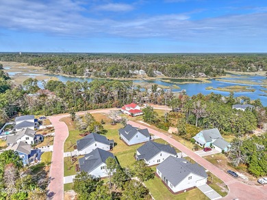 If you've been watching for the perfect coastal home, this on Brick Landing Plantation Yacht and Golf Club in North Carolina - for sale on GolfHomes.com, golf home, golf lot