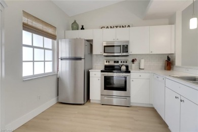 This private second-floor end unit residence is light  bright on Lely Resort Golf and Country Club in Florida - for sale on GolfHomes.com, golf home, golf lot