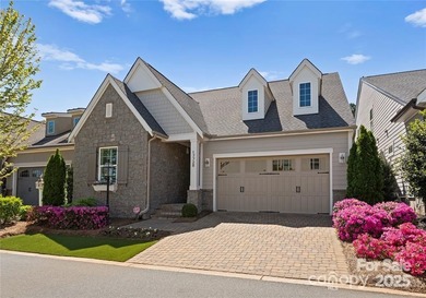 This exquisite Classica Home is the epitome of luxurious living on The Peninsula Club in North Carolina - for sale on GolfHomes.com, golf home, golf lot