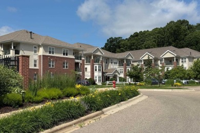Perched on the top floor of the coveted Bella Casa, this on Pleasant View Golf Club in Wisconsin - for sale on GolfHomes.com, golf home, golf lot