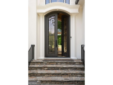 Tucked into a quiet cul-de-sac street within one of Suwanee's on Laurel Springs Golf Club in Georgia - for sale on GolfHomes.com, golf home, golf lot