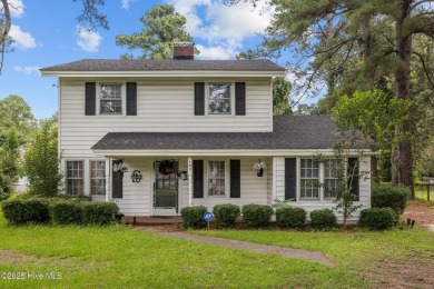 Enjoy quality time with loved ones in the spacious den, or host on Plymouth Country Club in North Carolina - for sale on GolfHomes.com, golf home, golf lot