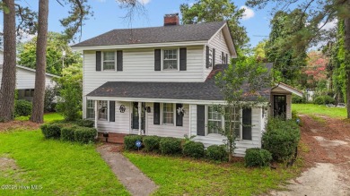 Enjoy quality time with loved ones in the spacious den, or host on Plymouth Country Club in North Carolina - for sale on GolfHomes.com, golf home, golf lot