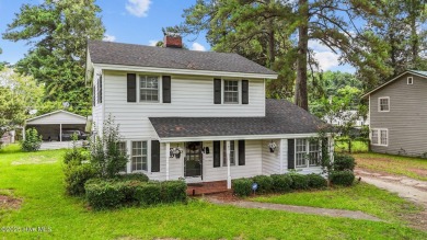Enjoy quality time with loved ones in the spacious den, or host on Plymouth Country Club in North Carolina - for sale on GolfHomes.com, golf home, golf lot