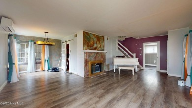 Enjoy quality time with loved ones in the spacious den, or host on Plymouth Country Club in North Carolina - for sale on GolfHomes.com, golf home, golf lot