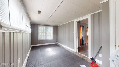 Enjoy quality time with loved ones in the spacious den, or host on Plymouth Country Club in North Carolina - for sale on GolfHomes.com, golf home, golf lot