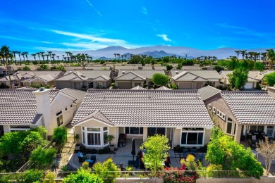 Enter through leaded glass double doors into an open concept on Mountain Vista Golf Course At Sun City Palm Desert in California - for sale on GolfHomes.com, golf home, golf lot