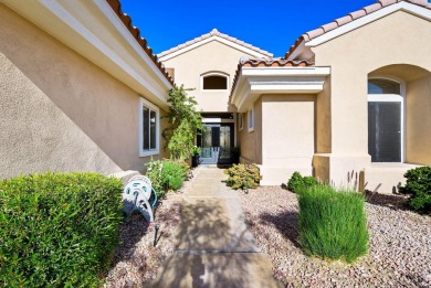 Enter through leaded glass double doors into an open concept on Mountain Vista Golf Course At Sun City Palm Desert in California - for sale on GolfHomes.com, golf home, golf lot