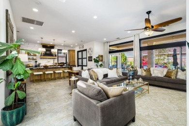 Enter through leaded glass double doors into an open concept on Mountain Vista Golf Course At Sun City Palm Desert in California - for sale on GolfHomes.com, golf home, golf lot