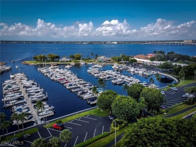 Inviting tropical oasis meets updated first floor convenience on The Landings Yacht, Golf and Tennis Club in Florida - for sale on GolfHomes.com, golf home, golf lot