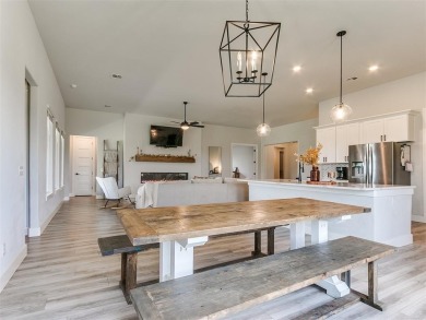 The neighborhood includes a pool, a golf course, a restaurant on Winter Creek Golf and Social Club in Oklahoma - for sale on GolfHomes.com, golf home, golf lot