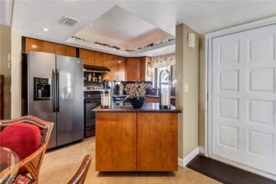 Inviting tropical oasis meets updated first floor convenience on The Landings Yacht, Golf and Tennis Club in Florida - for sale on GolfHomes.com, golf home, golf lot