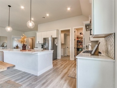 The neighborhood includes a pool, a golf course, a restaurant on Winter Creek Golf and Social Club in Oklahoma - for sale on GolfHomes.com, golf home, golf lot
