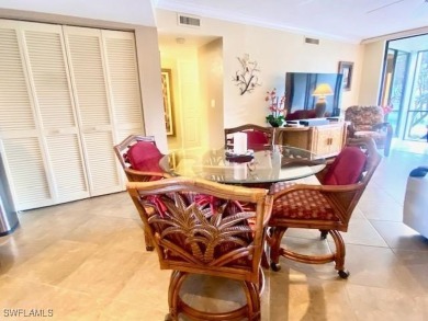 Inviting tropical oasis meets updated first floor convenience on The Landings Yacht, Golf and Tennis Club in Florida - for sale on GolfHomes.com, golf home, golf lot