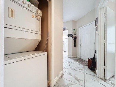 Welcome to 2948 Cottage Grove Ct -- a desirable end-unit condo on Ventura Country Club in Florida - for sale on GolfHomes.com, golf home, golf lot