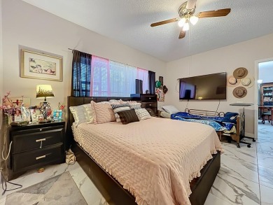 Welcome to 2948 Cottage Grove Ct -- a desirable end-unit condo on Ventura Country Club in Florida - for sale on GolfHomes.com, golf home, golf lot