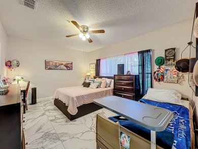 Welcome to 2948 Cottage Grove Ct -- a desirable end-unit condo on Ventura Country Club in Florida - for sale on GolfHomes.com, golf home, golf lot