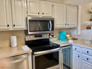 Coastal vibe, light and bright decor tastefully decorated and on The Landings Yacht, Golf and Tennis Club in Florida - for sale on GolfHomes.com, golf home, golf lot