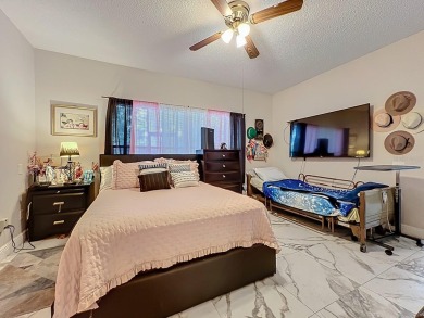 Welcome to 2948 Cottage Grove Ct -- a desirable end-unit condo on Ventura Country Club in Florida - for sale on GolfHomes.com, golf home, golf lot