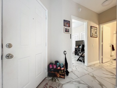 Welcome to 2948 Cottage Grove Ct -- a desirable end-unit condo on Ventura Country Club in Florida - for sale on GolfHomes.com, golf home, golf lot