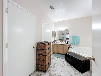 Welcome to 2948 Cottage Grove Ct -- a desirable end-unit condo on Ventura Country Club in Florida - for sale on GolfHomes.com, golf home, golf lot