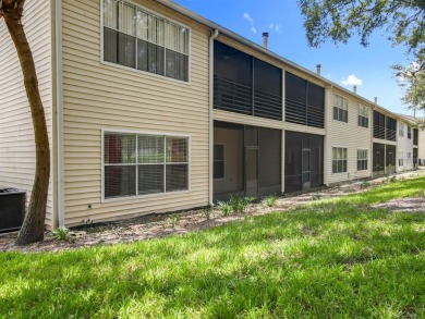 Welcome to 2948 Cottage Grove Ct -- a desirable end-unit condo on Ventura Country Club in Florida - for sale on GolfHomes.com, golf home, golf lot