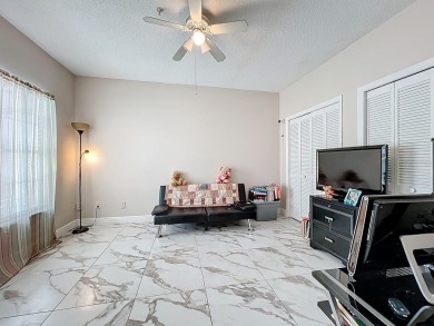 Welcome to 2948 Cottage Grove Ct -- a desirable end-unit condo on Ventura Country Club in Florida - for sale on GolfHomes.com, golf home, golf lot