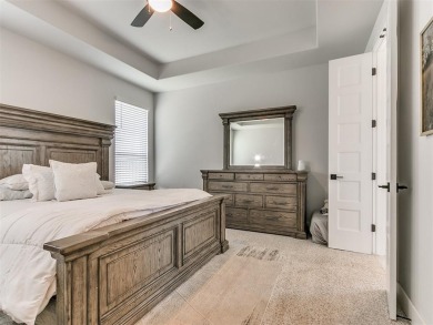 The neighborhood includes a pool, a golf course, a restaurant on Winter Creek Golf and Social Club in Oklahoma - for sale on GolfHomes.com, golf home, golf lot
