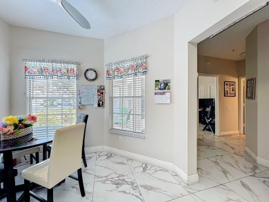 Welcome to 2948 Cottage Grove Ct -- a desirable end-unit condo on Ventura Country Club in Florida - for sale on GolfHomes.com, golf home, golf lot