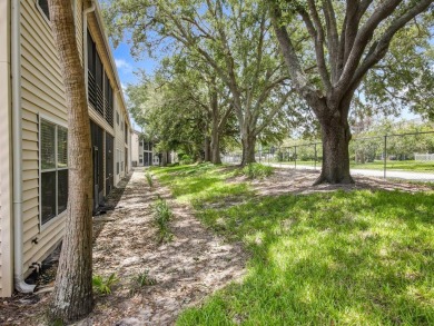 Welcome to 2948 Cottage Grove Ct -- a desirable end-unit condo on Ventura Country Club in Florida - for sale on GolfHomes.com, golf home, golf lot
