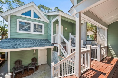 Nestled along Davis Love's picturesque 16th fairway with a on Ocean Creek Golf Course in South Carolina - for sale on GolfHomes.com, golf home, golf lot