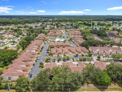 Welcome to 2948 Cottage Grove Ct -- a desirable end-unit condo on Ventura Country Club in Florida - for sale on GolfHomes.com, golf home, golf lot