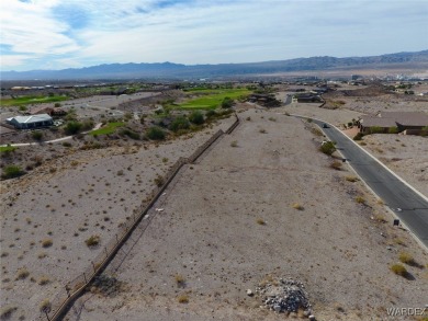 This private homesite offers views of the golf course while the on Laughlin Ranch Golf Club in Arizona - for sale on GolfHomes.com, golf home, golf lot