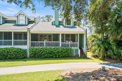 Nestled along Davis Love's picturesque 16th fairway with a on Ocean Creek Golf Course in South Carolina - for sale on GolfHomes.com, golf home, golf lot